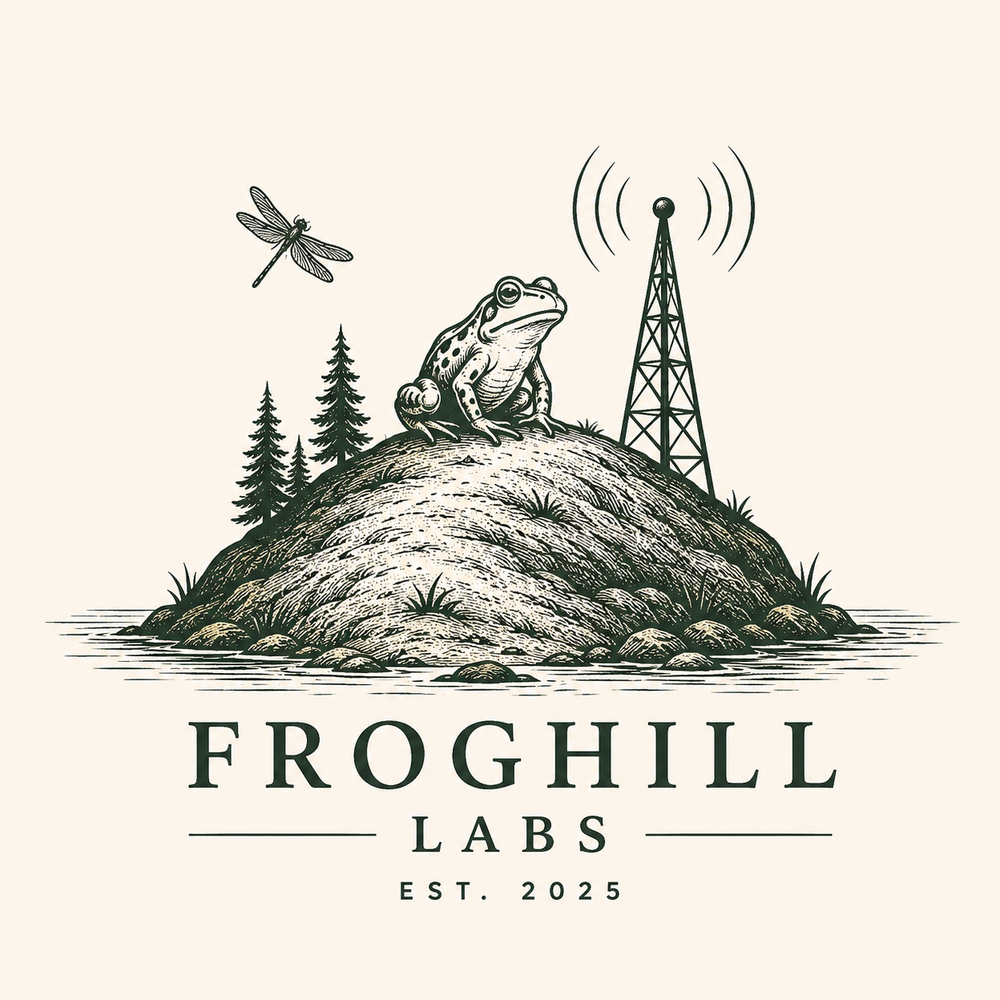 Frog Hill Labs emblem showing a frog on a hill beside a radio tower, with water and a dragonfly